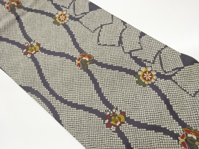 Nagoya obi with butterfly, helmet, and flower patterns woven into a tatewaku pat